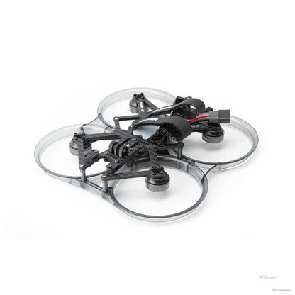 Angled rear-side view of ducted cinewhoop with battery strap and power connector lead visible