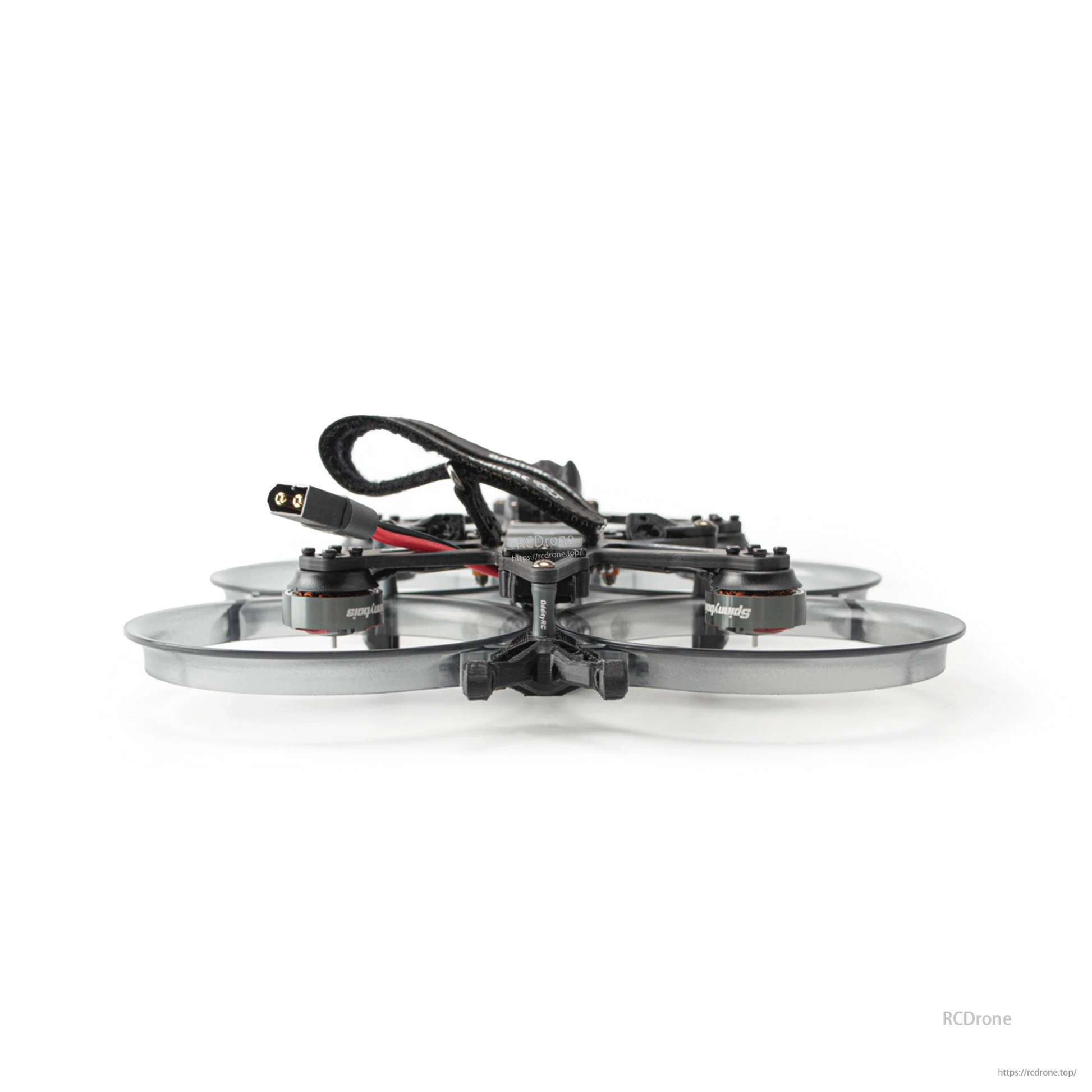 Front view of ducted cinewhoop drone showing frame standoffs, motor pods, and wiring loop