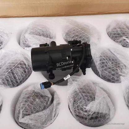 Original DJI AGRAS T30 Water Pump, DJI Agras T30 water pump assembly with attached signal cable and blue connector, packaged in foam insert