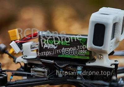 Ovonic 6S 1800mAh 100C LiPo installed on an FPV quad with XT60 lead and balance plug visible