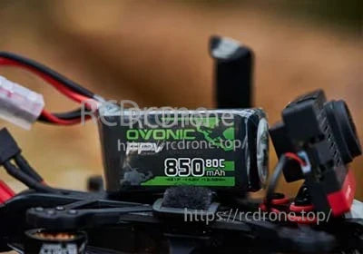 Ovonic 4S 850mAh 80C LiPo battery mounted on an FPV drone, label visible on the side