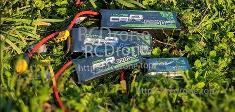 Ovonic AIR 2200mAh 3S 11.1V 25C LiPo batteries with XT60 connectors on grass