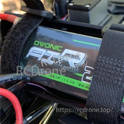 Ovonic 2200mAh 3S 11.1V 50C LiPo battery strapped in an RC model with wiring visible
