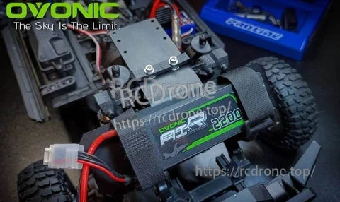 Ovonic 3S 2200mAh 35C shorty LiPo installed in an RC car battery tray with strap and Deans connector