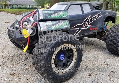 Two Ovonic Rebel 4S 6500mAh LiPo batteries installed in an RC truck with XT90 connectors