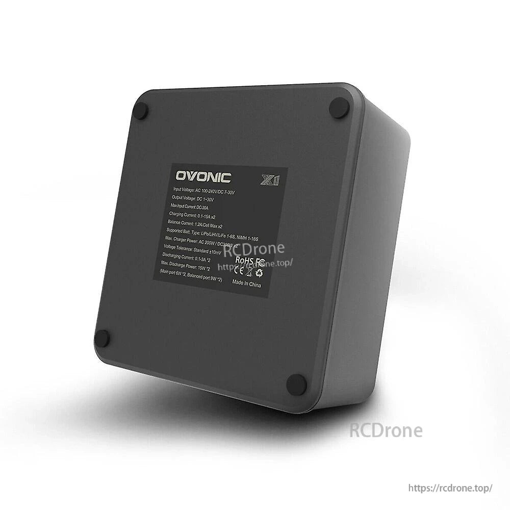 Bottom view showing Ovonic X1 Pro charger specification label and rubber feet