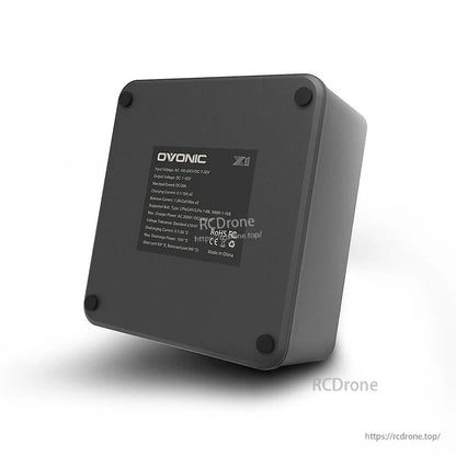 Bottom view showing Ovonic X1 Pro charger specification label and rubber feet