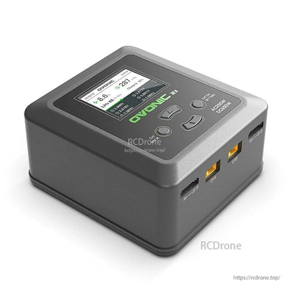 Angled top view of Ovonic X1 Pro smart balance charger showing display, buttons, and AC/DC power rating label