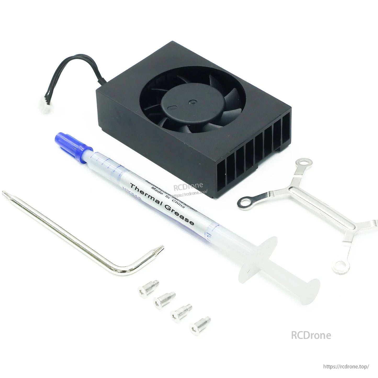 Cooling fan kit arranged together with thermal grease syringe, bracket, hex key, and screws