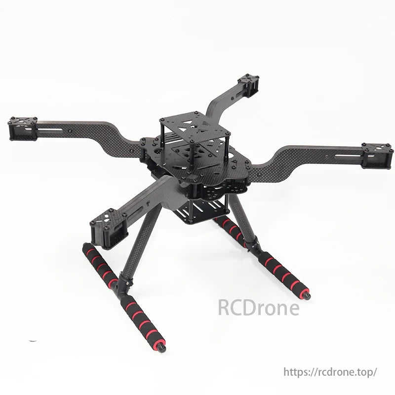 Pixhawk Multi-Rotor Drone, A package containing a carbon fiber drone frame, landing gear, mounting screws, and assembly instructions for motor mounting.
