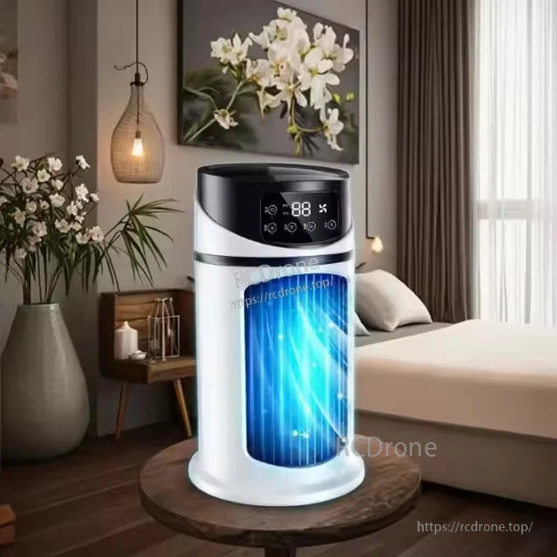 Portable mini air cooler tower fan in white with digital display and blue cooling light, on a bedside table