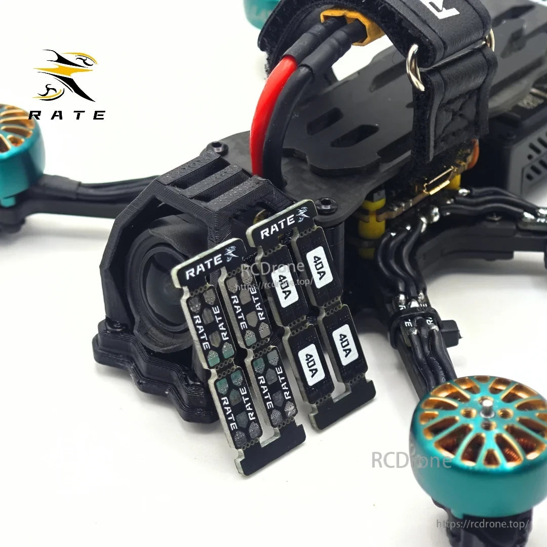RATEFPV motor wire extension boards mounted on an FPV drone beside brushless motors