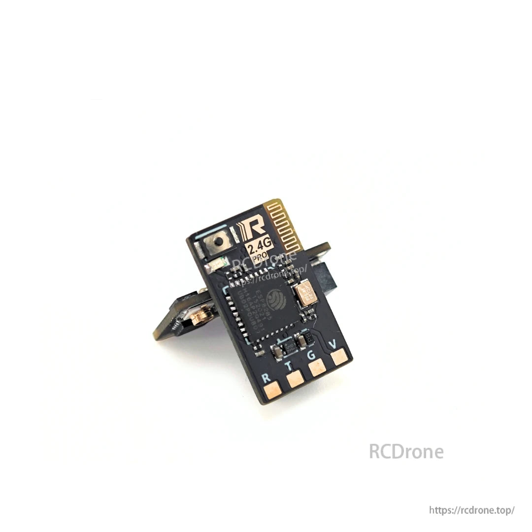 Close-up of RATEFPV 2.4G receiver circuit board with antenna connection and labeled solder pads