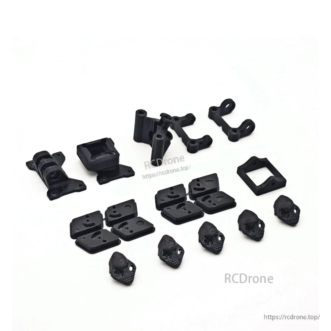 Included black printed accessory mounts and protective parts for the FPV frame