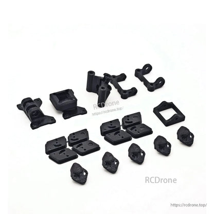 Included black printed accessory mounts and protective parts for the FPV frame