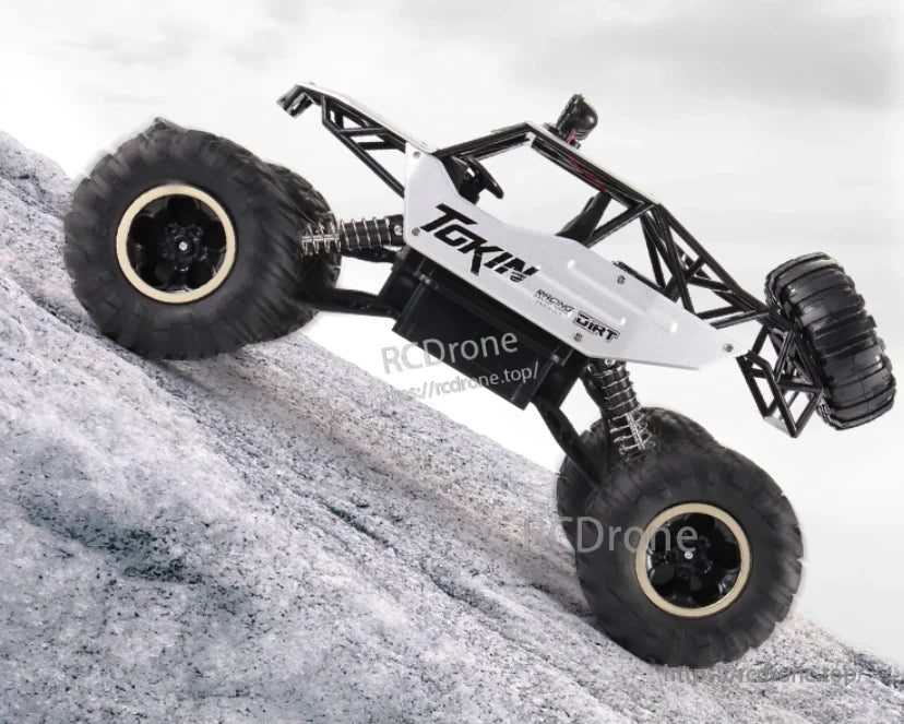 RC Off-Road Truck 1/12 4WD Alloy Climbing Car, Tokin 1/12 4WD alloy off-road truck with dual motors, 2.4GHz remote, 20km/h speed, and 45° slope climbing ability.
