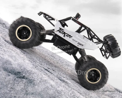 RC Off-Road Truck 1/12 4WD Alloy Climbing Car, Tokin 1/12 4WD alloy off-road truck with dual motors, 2.4GHz remote, 20km/h speed, and 45° slope climbing ability.