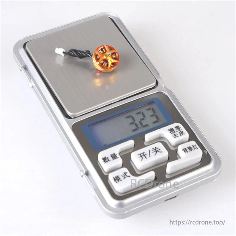 RCINPOWER GTS V3 1003 brushless FPV motor for micro drones weighs 3.23 grams on digital scale.