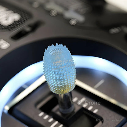 RJX 1 Pair Thumb Grippies Non-Slip Radio Stick, Blue textured RJX thumb grippie cap installed on an RC radio controller stick for a non-slip grip
