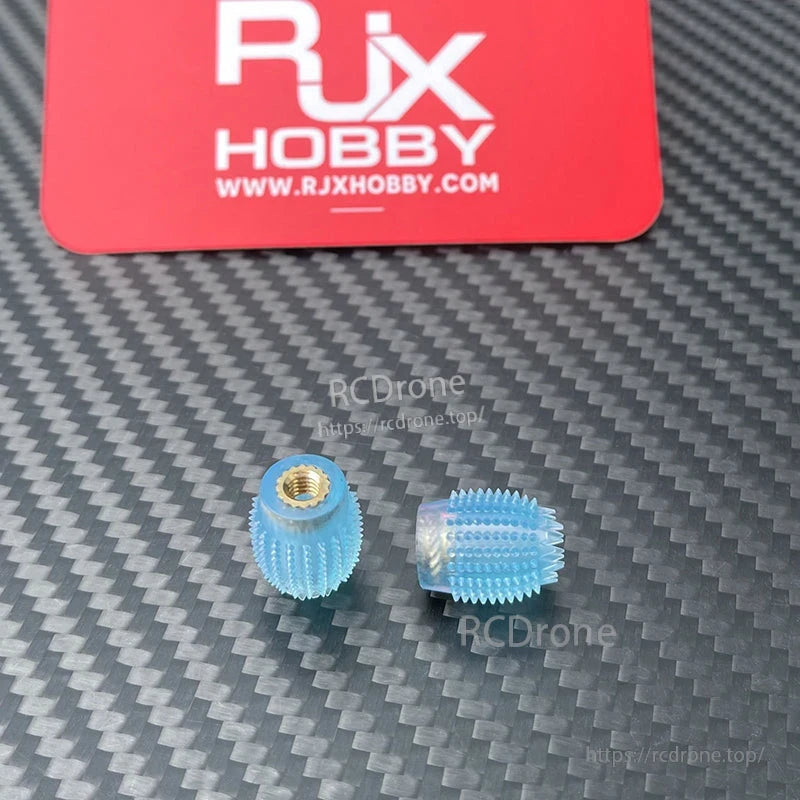 RJX 1 Pair Thumb Grippies Non-Slip Radio Stick, Pair of RJX blue non-slip radio stick thumb grippies with brass threaded inserts on carbon-fiber surface