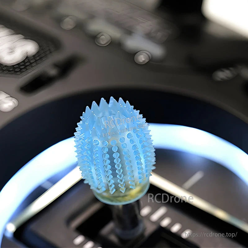 RJX 1 Pair Thumb Grippies Non-Slip Radio Stick, Blue spiked non-slip thumb grippie installed on an RC radio transmitter stick for extra grip and control