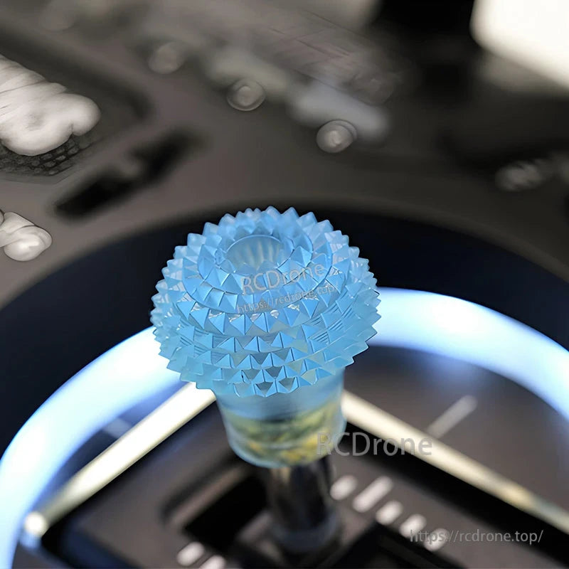 RJX 1 Pair Thumb Grippies Non-Slip Radio Stick, Blue textured RJX thumb grippy installed on a radio transmitter stick for a non-slip grip upgrade.