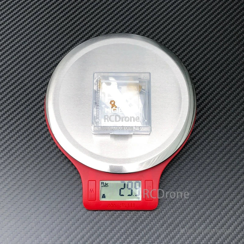 Small parts pack on a digital scale displaying 29.9 g, gimbal stick end hardware set for radio controller