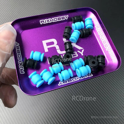 RJX 100pcs 13x9x3.5mm Silicone Damping Ball, Blue and black RJX silicone damping balls for RC/drone mounting, small spool-shaped vibration dampers