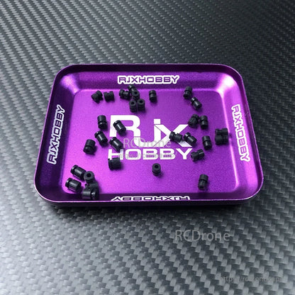 RJX 100pcs Silicone Anti-Vibration Damping Ball, Black silicone anti-vibration damping balls scattered on a purple RJXHOBBY parts tray