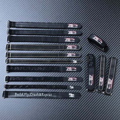 RJX 10pcs Kevlar Battery Strap, Assorted RJX black Kevlar battery straps with metal buckles and stitched edges, laid out in a set