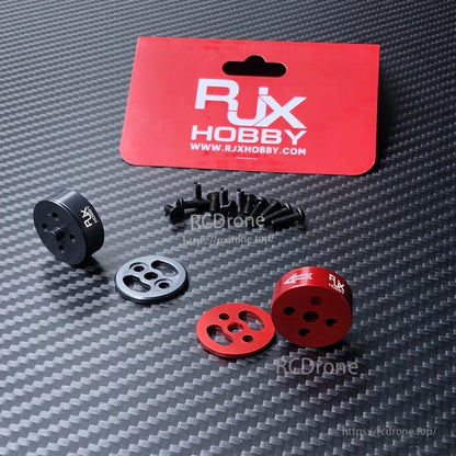RJX Hobby quick release prop adapter set with red and black aluminum hubs, adapter plates, and mounting screws