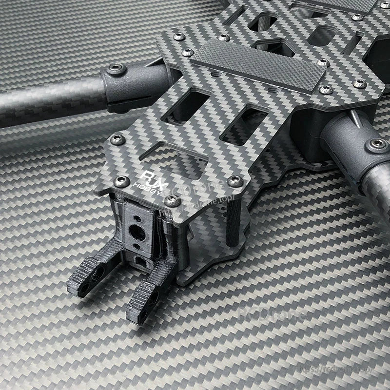 RJX carbon fiber FPV racing drone frame kit with layered top plate, standoffs, and front camera mount