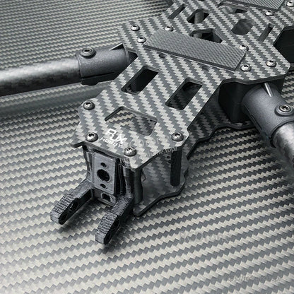 RJX carbon fiber FPV racing drone frame kit with layered top plate, standoffs, and front camera mount