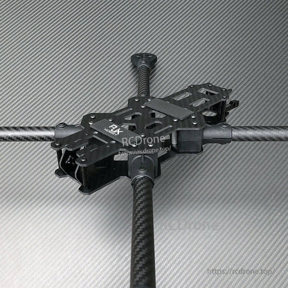 RJX 13-inch carbon fiber FPV drone frame kit with 4 arms and central plate stack, top view
