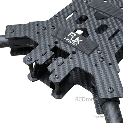 RJX Hobby carbon fiber FPV drone frame kit close-up with plate cutouts, standoffs and mounting screws
