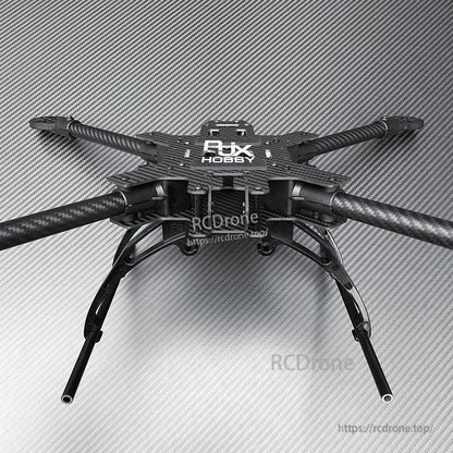 RJX carbon fiber FPV drone frame kit with long tubular arms and tall landing gear skids