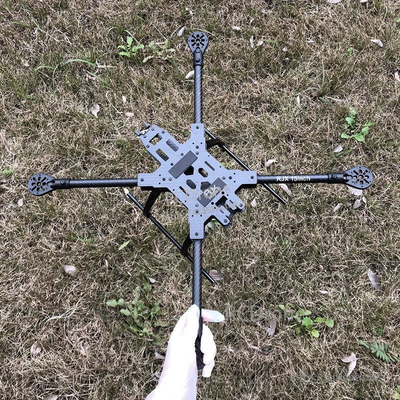 RJX 15inch carbon fiber FPV drone frame kit with X arms, center plates, and landing gear skids
