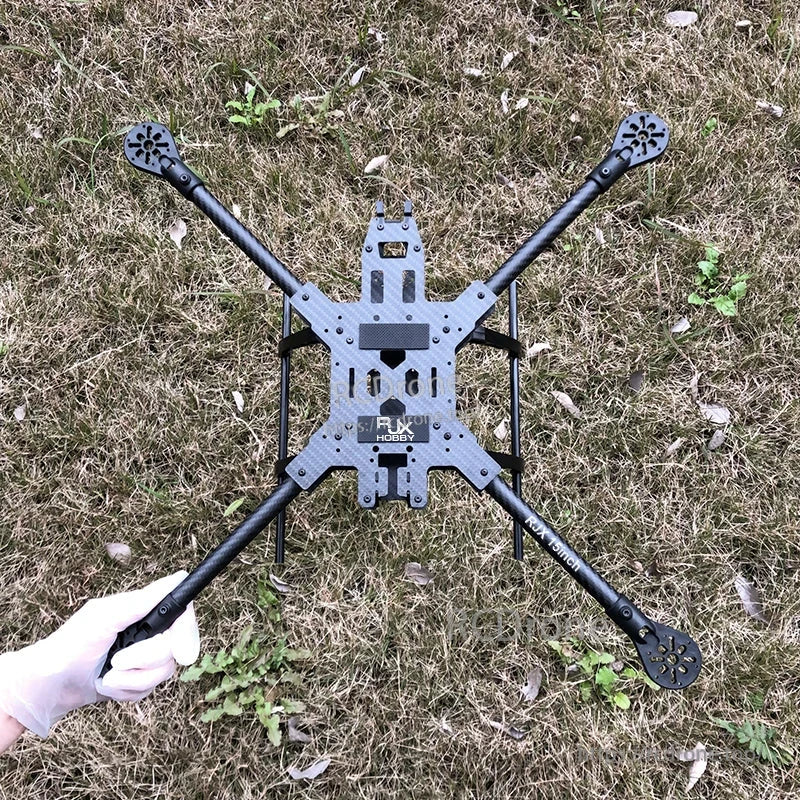 RJX 15-inch carbon fiber FPV racing drone frame with X-style arms, center plate, and landing gear rails