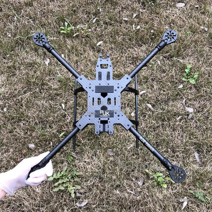 RJX 15-inch carbon fiber FPV racing drone frame with X-style arms, center plate, and landing gear rails