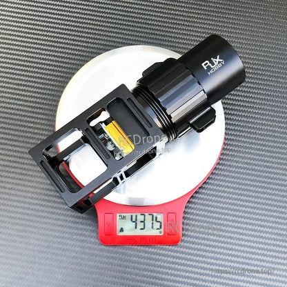 RJX Hobby AS150U quick-release plug connector for UAV drone arms on a scale showing 437.5 g