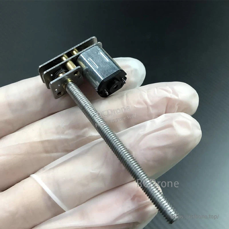 N20 micro DC gear motor with metal gearbox, mounting bracket, and long threaded lead screw rod