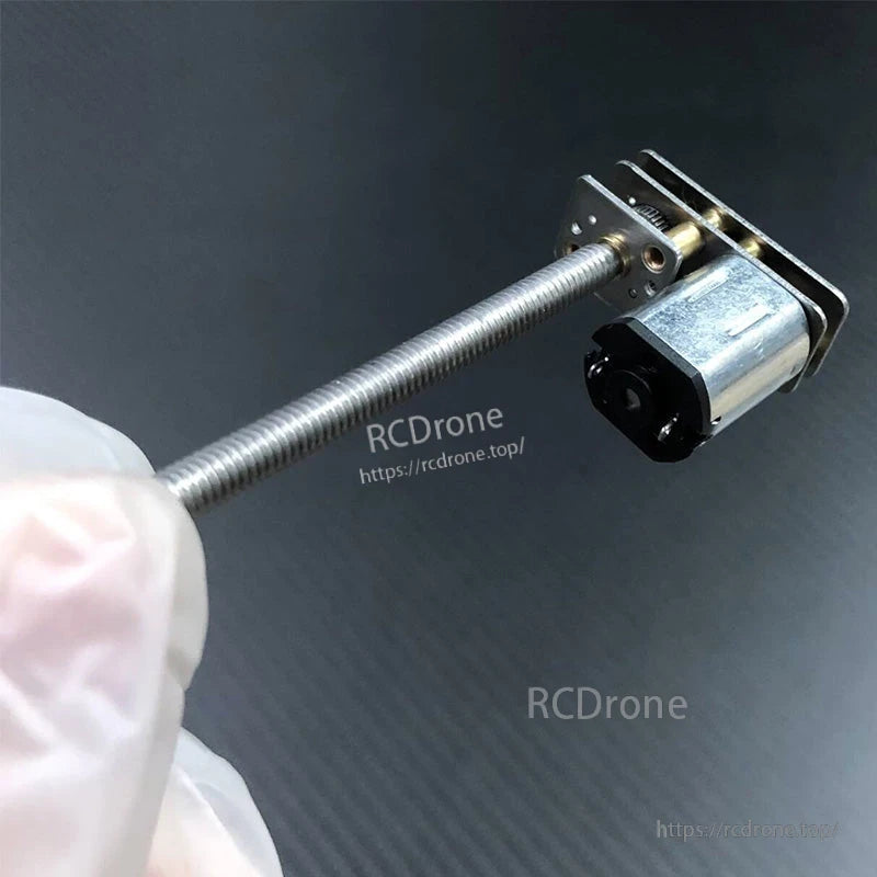 N20 micro DC gear motor with metal gearbox and long threaded lead screw, compact right-angle mount