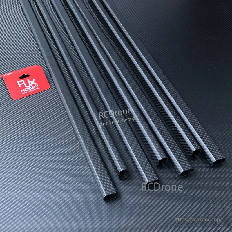 RJX 20x30mm Carbon Fiber Octagonal Tube, RJX hobby octagonal carbon fiber tube stock, multiple 20x30mm tubes with visible carbon weave finish