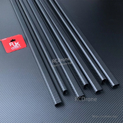 RJX 20x30mm Carbon Fiber Octagonal Tube, RJX hobby octagonal carbon fiber tube stock, multiple 20x30mm tubes with visible carbon weave finish
