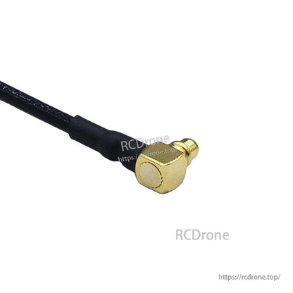 Close-up of an MMCX right-angle connector on a 5.8GHz FPV antenna cable for VTX setups