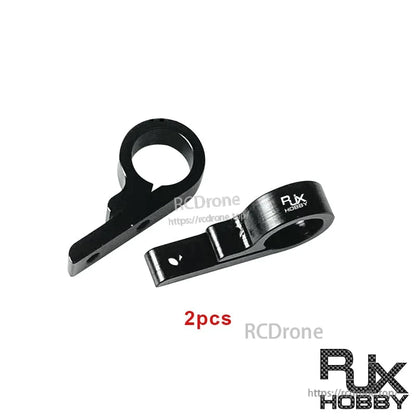 Pair of RJX black aluminum alloy 10mm tube clamp connectors with 9-shape mounting tabs for carbon boards