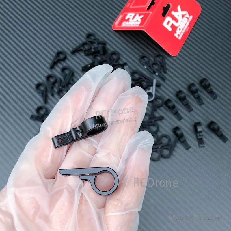 RJX aluminum 9-shape tube connector joint pieces with clamp ring and mounting tab in black finish