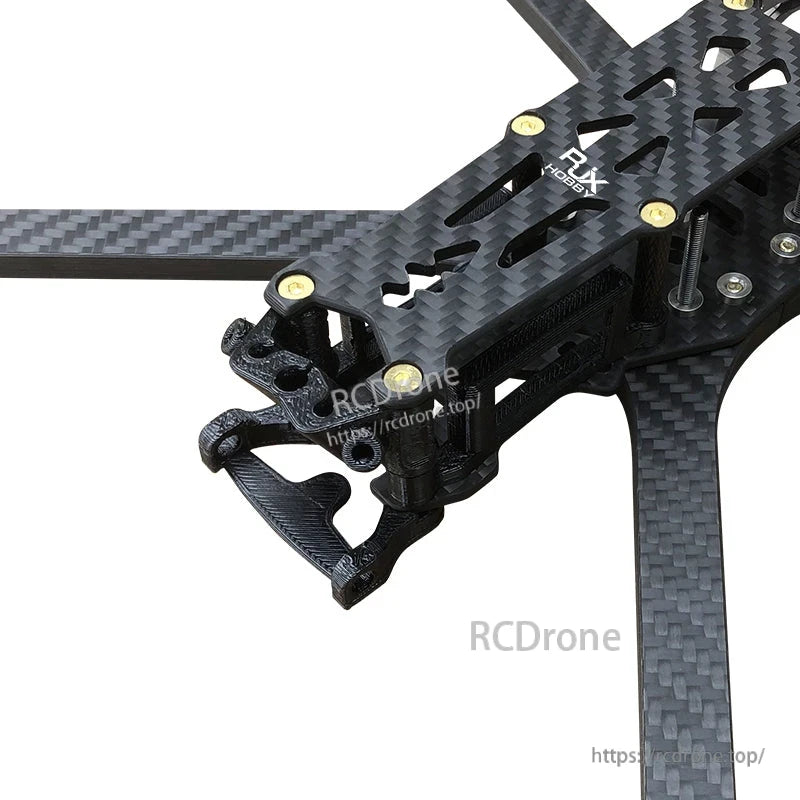 Black 3D printed front bumper and mounting bracket installed on a carbon fiber Mark5 DC-style FPV frame