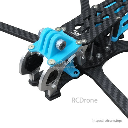 Blue 3D printed replacement mount installed on a carbon fiber FPV drone frame front assembly