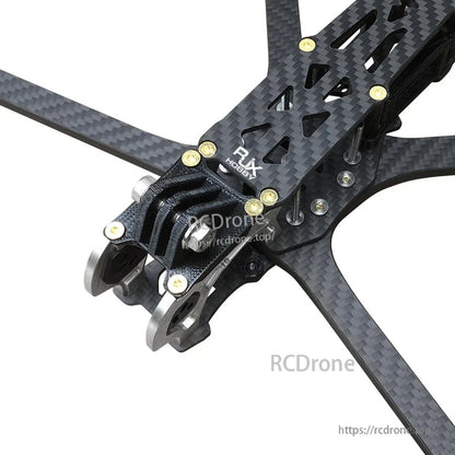 RJX Hobby carbon fiber FPV drone frame with 3D printed front camera mount and metal side plates